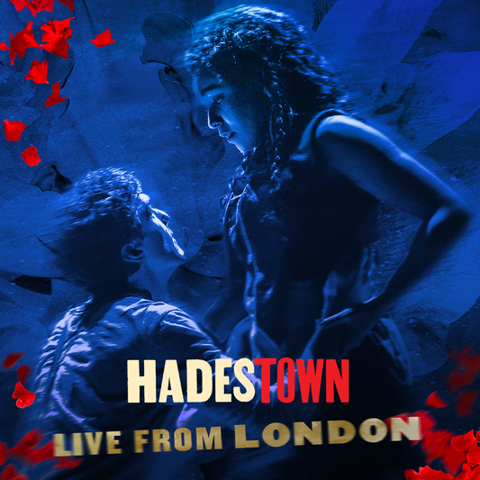 Cover art for the vinyl album 'Hadestown: Live From London' featuring a dark, atmospheric scene with a man and woman gazing into each other's eyes, surrounded by red flowers.