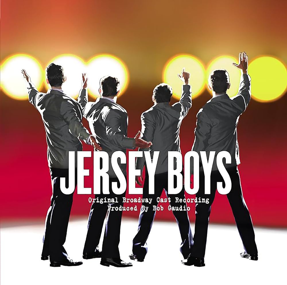 Cover of the Jersey Boys Original Broadway Cast Recording vinyl album featuring four members of the band in a live setting with their backs towards the audience, with the title text across the front.