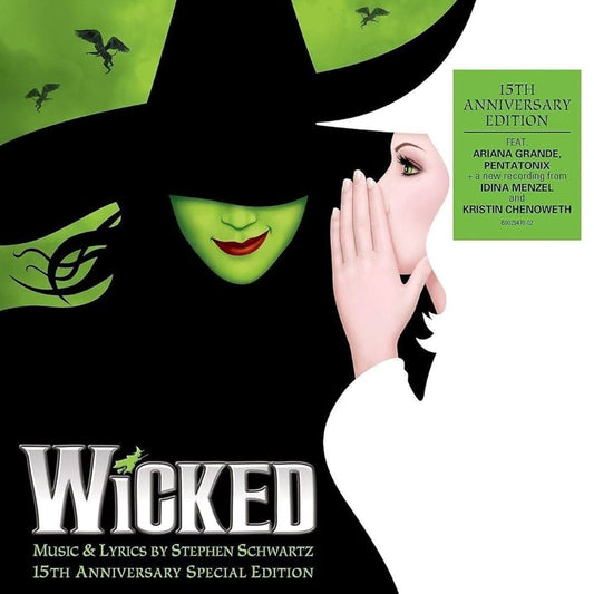 Promotional poster for 'Wicked' with a witch's face and hand, featuring Ariana Grande and Pentatonix.