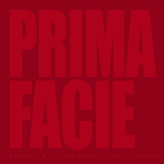 A red vinyl record titled 'Prima Facie' with white text on it, indicating it is a soundtrack for a theatre play.